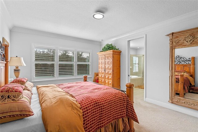 carpeted bedroom with connected bathroom, a textured ceiling, and crown molding