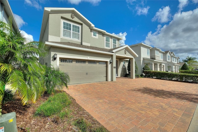 view of front of property featuring a garage