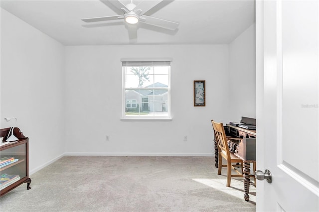 carpeted office with ceiling fan