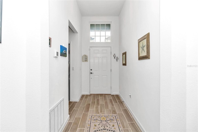 doorway to outside featuring light hardwood / wood-style flooring