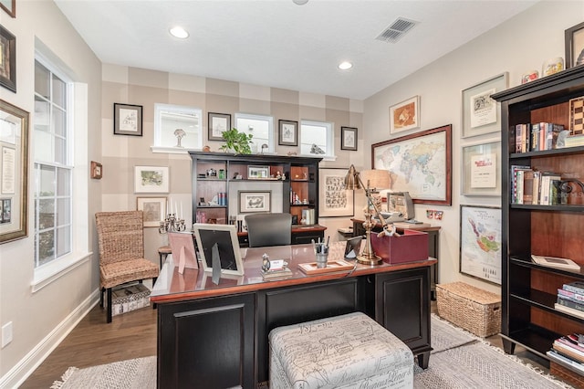 office space with hardwood / wood-style floors