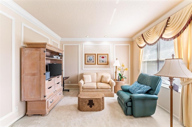 sitting room featuring ornamental molding, light colored carpet, and a textured ceiling