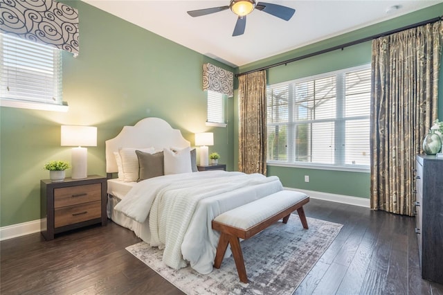 bedroom featuring dark wood-type flooring and ceiling fan