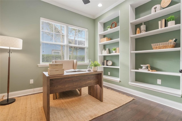 office featuring built in features, hardwood / wood-style flooring, and ornamental molding