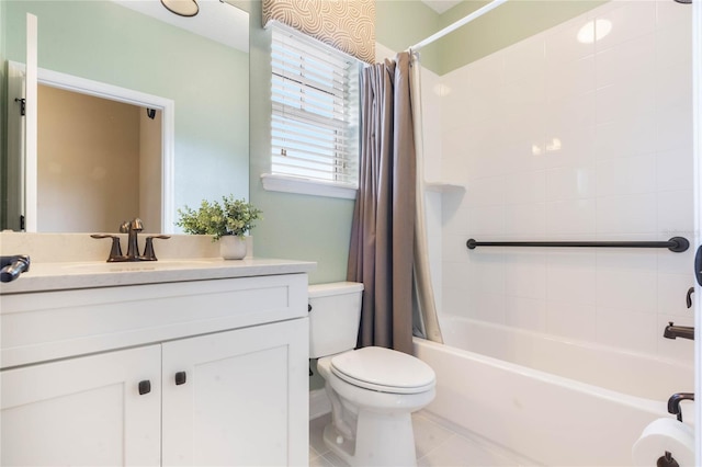 full bathroom with shower / tub combo with curtain, vanity, toilet, and tile patterned floors