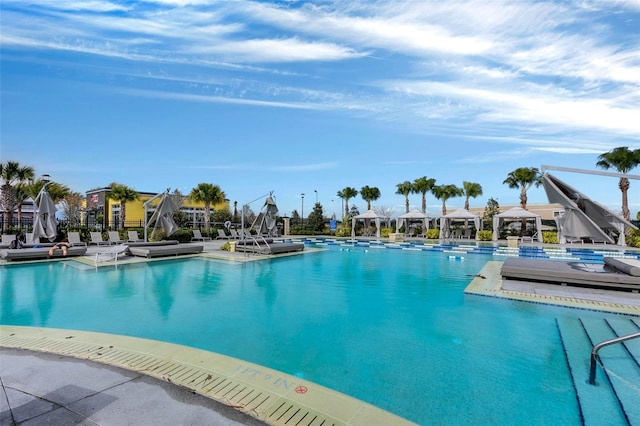 view of swimming pool featuring a patio area