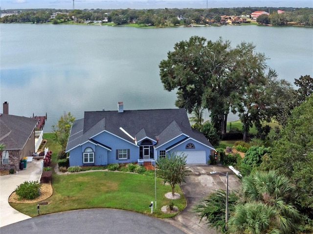 bird's eye view with a water view