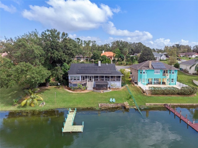 aerial view featuring a water view