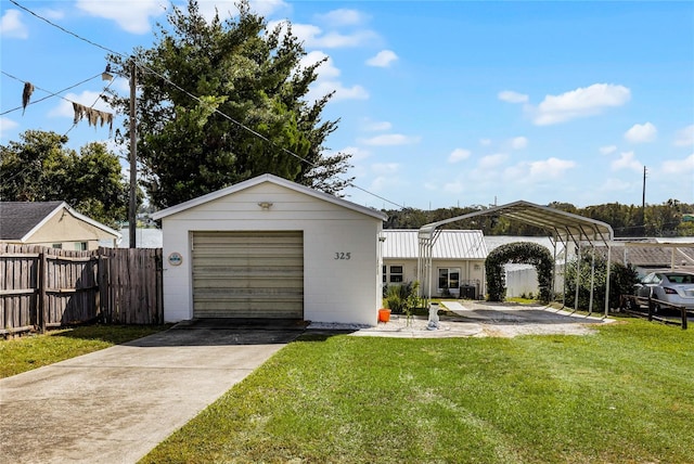 view of front facade with a front yard and a carport