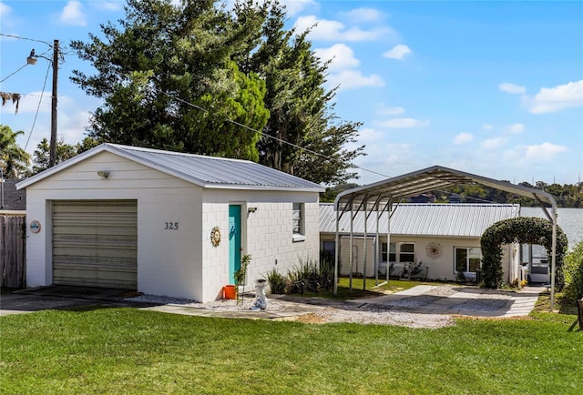 garage with a lawn