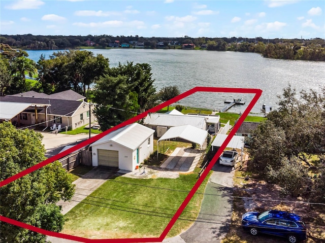 birds eye view of property featuring a water view