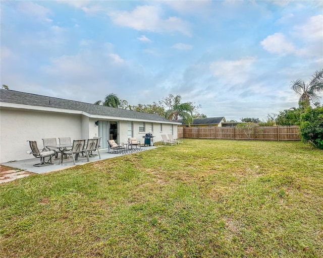 view of yard with a patio area