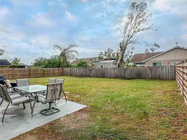 3310 W 63rd St W, Bradenton, FL 34209 - fenced backyard featuring a patio and outdoor dining space