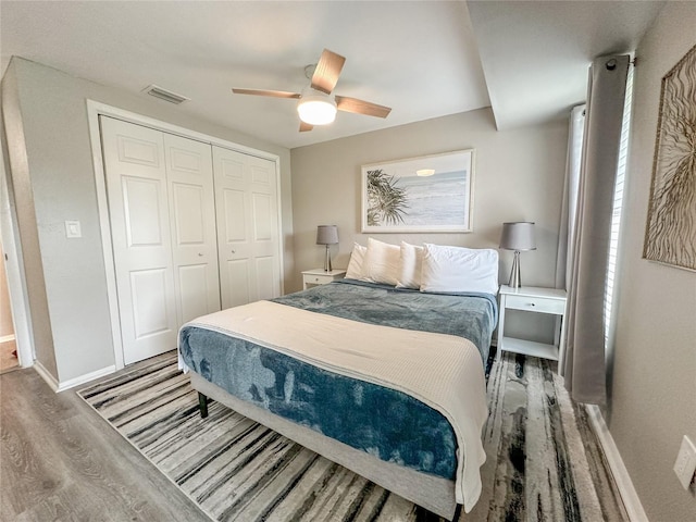 3310 W 63rd St W, Bradenton, FL 34209 - bedroom featuring wood finished floors, a closet, and ceiling fan