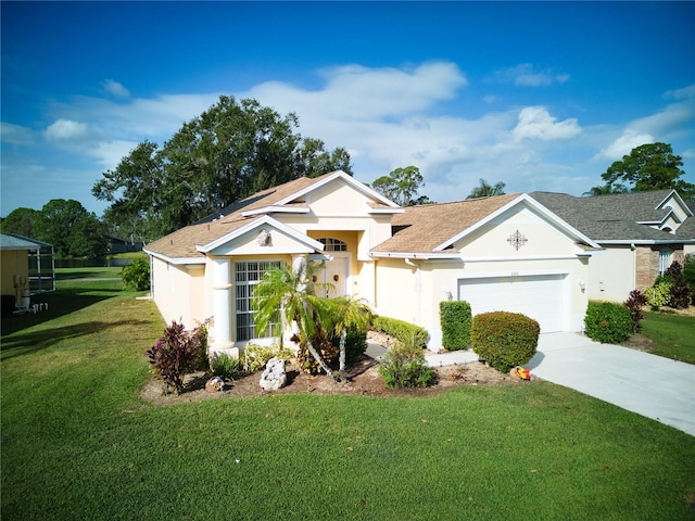 view of front facade with a garage and a front lawn