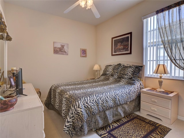 bedroom featuring carpet and ceiling fan