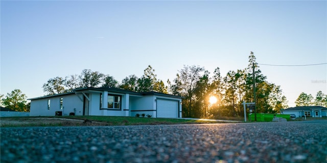 ranch-style home with a garage