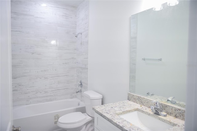 full bathroom featuring vanity, toilet, and tiled shower / bath combo