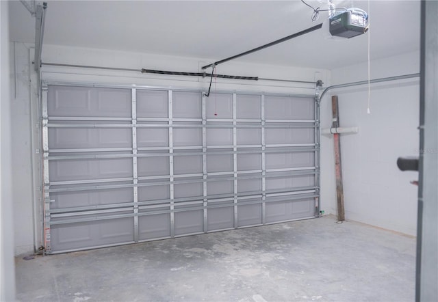 garage featuring a garage door opener