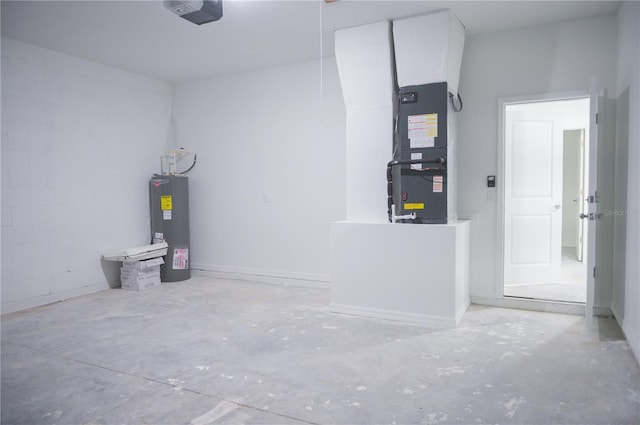 utility room with heating unit and water heater