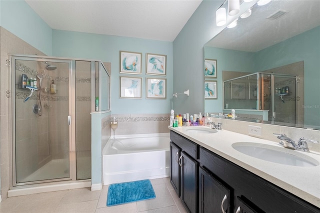 bathroom with vanity, plus walk in shower, and tile patterned flooring