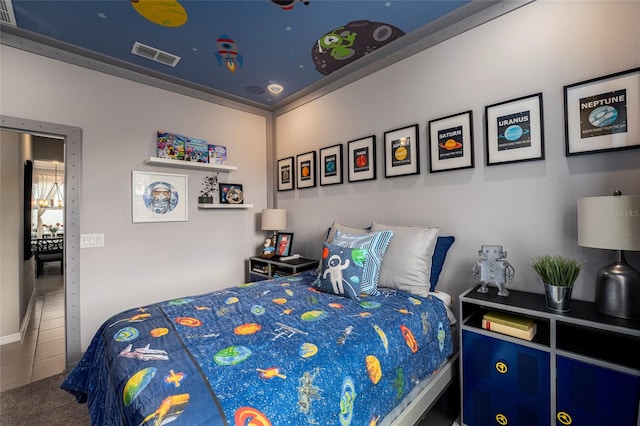 bedroom featuring tile patterned flooring