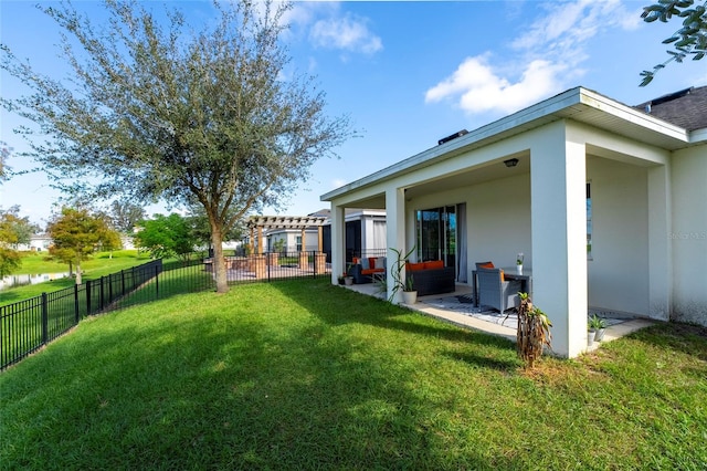 view of yard with a pergola and a patio area