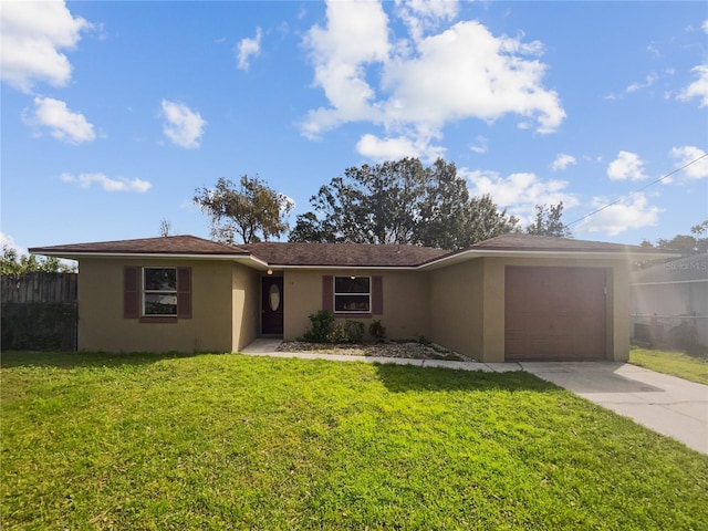 ranch-style house with a front lawn and a garage