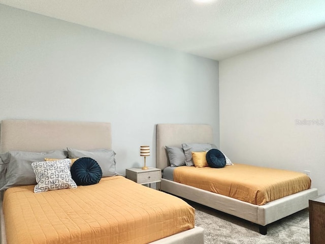 bedroom featuring carpet flooring