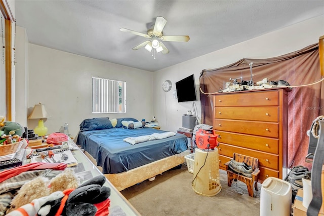 carpeted bedroom with ceiling fan