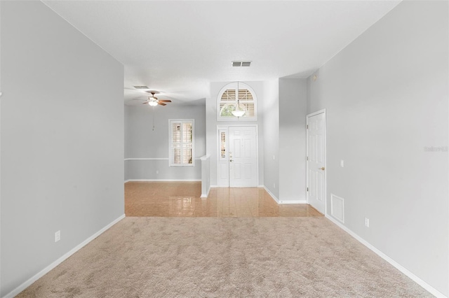 2626 Raccoon Run Ln, Orlando, FL 32837 - carpeted spare room featuring a ceiling fan and baseboards