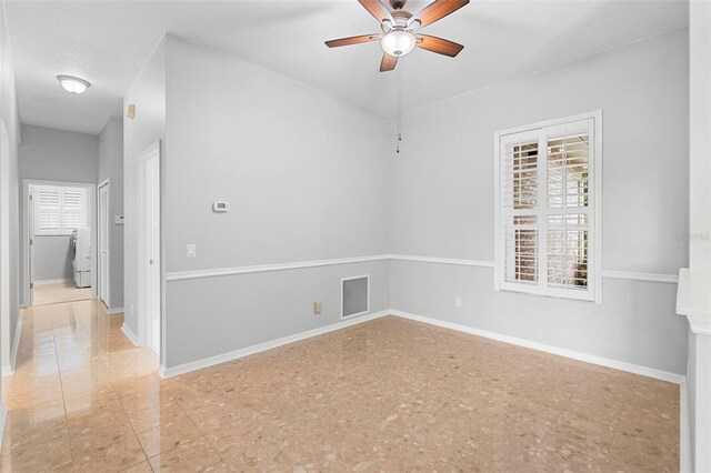 2626 Raccoon Run Ln, Orlando, FL 32837 - unfurnished room with washer / clothes dryer, ceiling fan, and baseboards