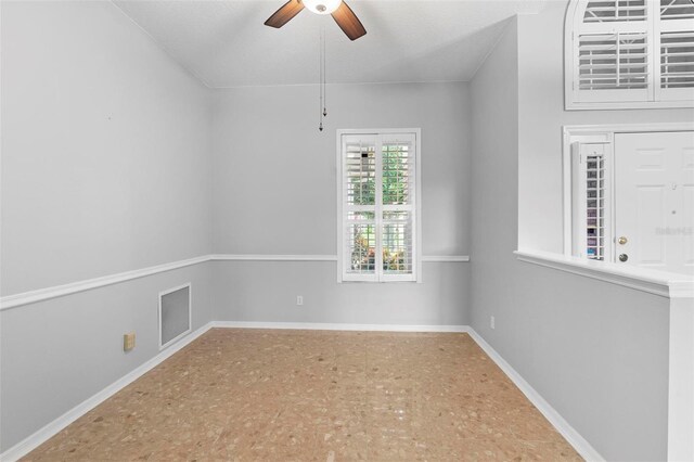2626 Raccoon Run Ln, Orlando, FL 32837 - empty room featuring a ceiling fan and baseboards