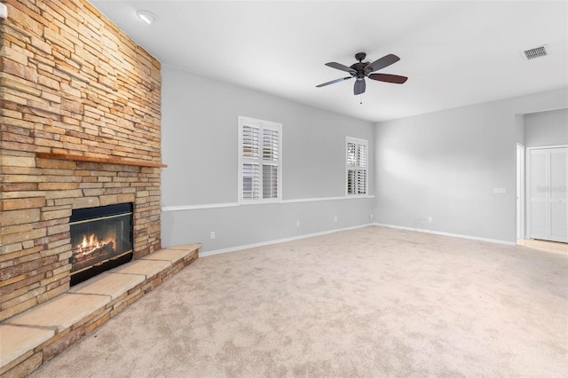2626 Raccoon Run Ln, Orlando, FL 32837 - unfurnished living room with a fireplace, a ceiling fan, carpet flooring, and baseboards