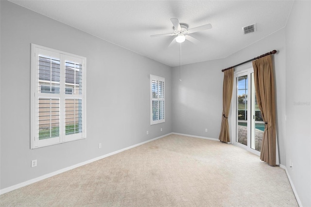 2626 Raccoon Run Ln, Orlando, FL 32837 - spare room with plenty of natural light, light carpet, a ceiling fan, and baseboards