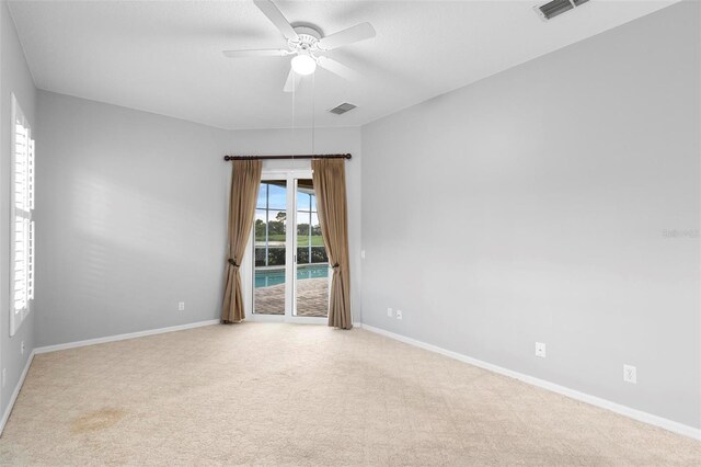 2626 Raccoon Run Ln, Orlando, FL 32837 - carpeted spare room with a ceiling fan and baseboards