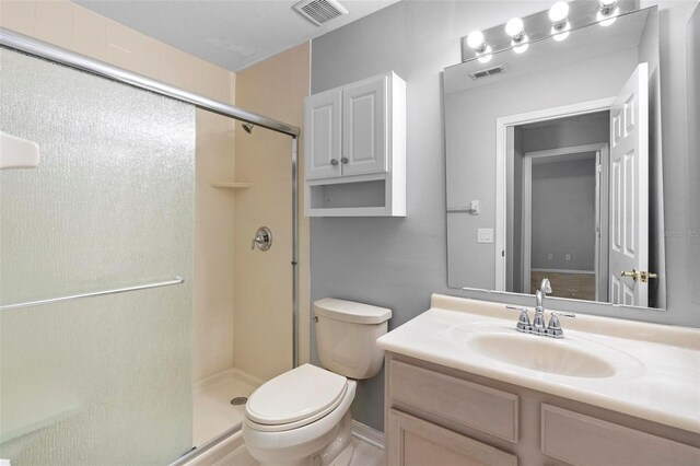 2626 Raccoon Run Ln, Orlando, FL 32837 - full bath featuring toilet, a shower stall, and vanity