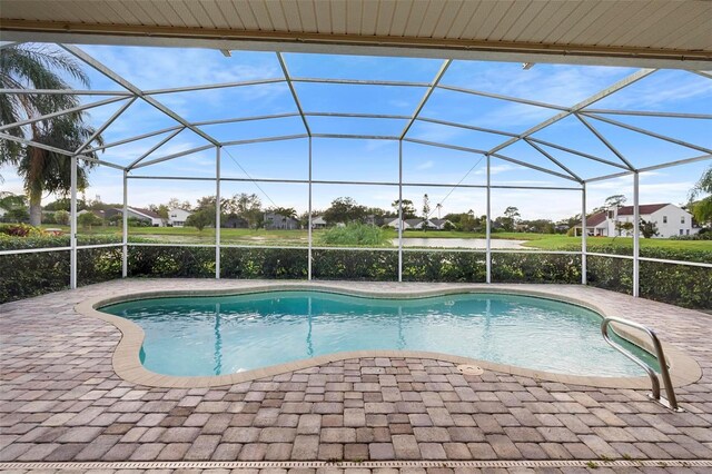 2626 Raccoon Run Ln, Orlando, FL 32837 - outdoor pool with a patio, a residential view, and a lanai