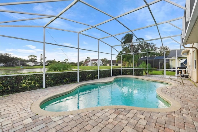 2626 Raccoon Run Ln, Orlando, FL 32837 - outdoor pool featuring a patio area and glass enclosure