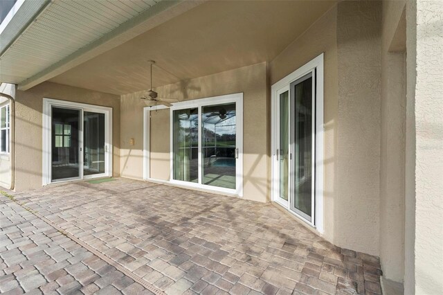 2626 Raccoon Run Ln, Orlando, FL 32837 - view of patio featuring ceiling fan