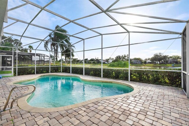 2626 Raccoon Run Ln, Orlando, FL 32837 - swimming pool featuring a patio