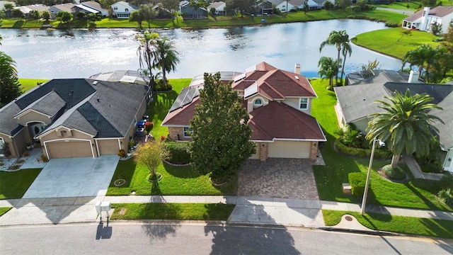 drone / aerial view with a water view