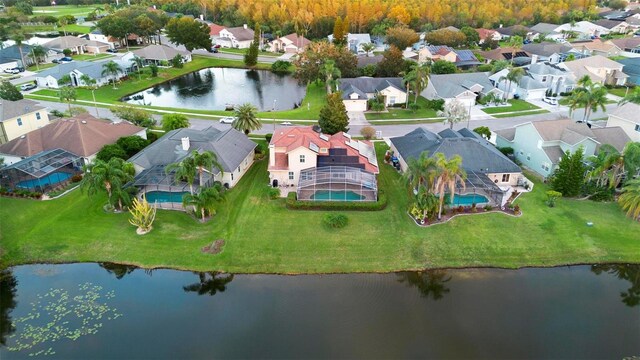 2626 Raccoon Run Ln, Orlando, FL 32837 - aerial perspective of suburban area featuring a large body of water