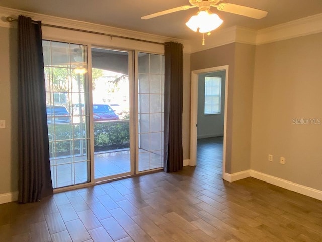 doorway to outside featuring hardwood / wood-style flooring, crown molding, ceiling fan, and a healthy amount of sunlight