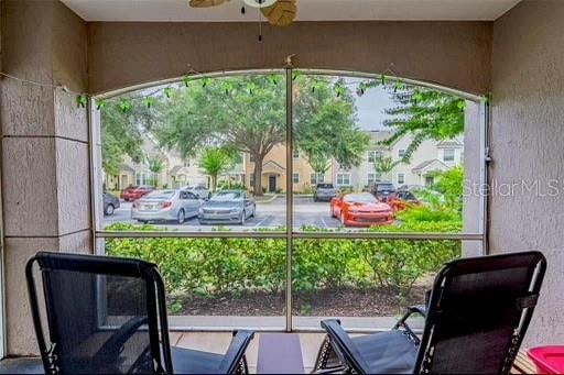 balcony featuring ceiling fan