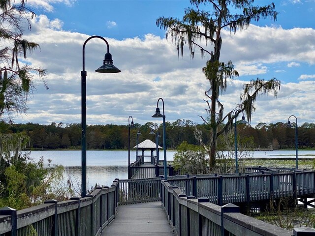3468 Soho St Unit 107, Orlando, FL 32835 - view of home's community featuring a water view and a forest view