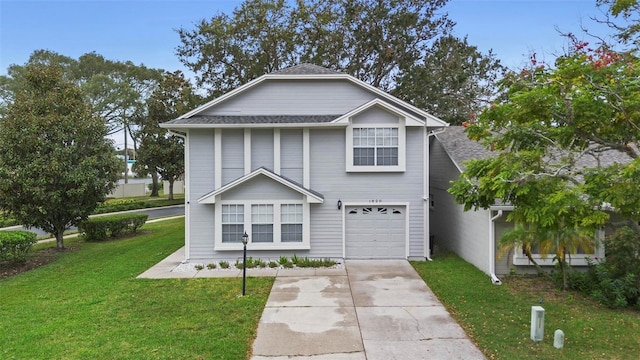 view of front of property featuring a garage and a front lawn