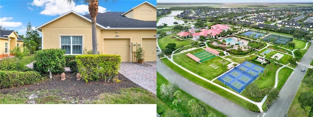 view of front of property with a garage