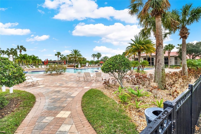 exterior space with a patio and a community pool