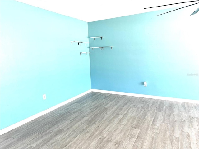 spare room with light hardwood / wood-style floors